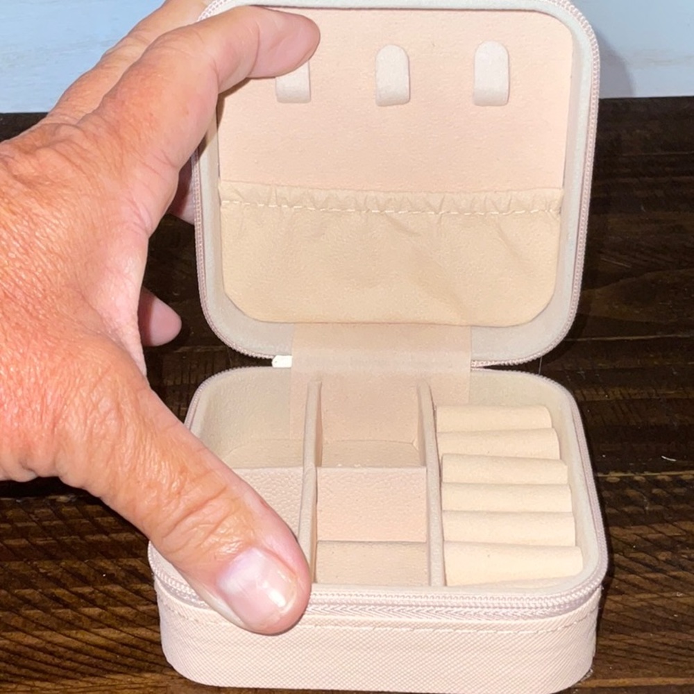 Free w/purchase of $25  Travel Jewelry box 4” square Free with $25 purchase.